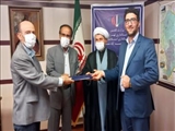 تجلیل بخشدار احمدآباد مستوفی از  جاماسب طاهری ، جانباز جنگ تحمیلی به مناسبت گرامیداشت  هفته دفاع مقدس